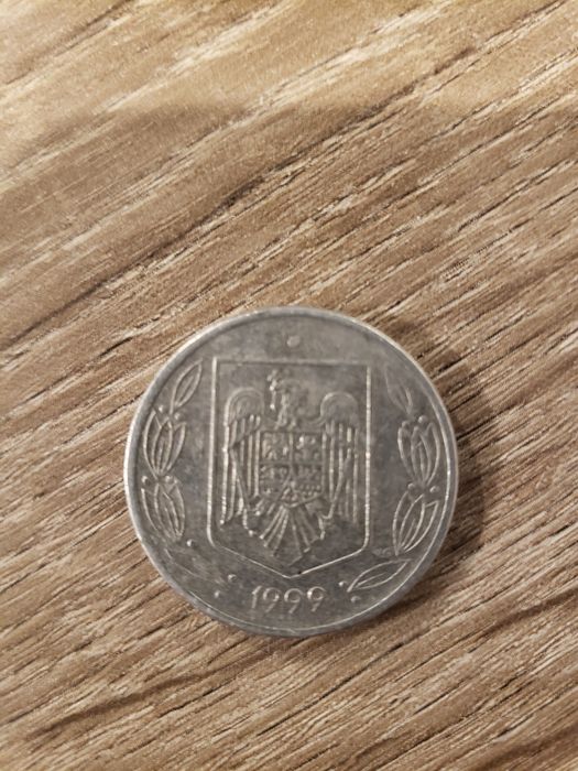 Vand moneda 500 de lei an 1999 pret 3000 de lei negociabil