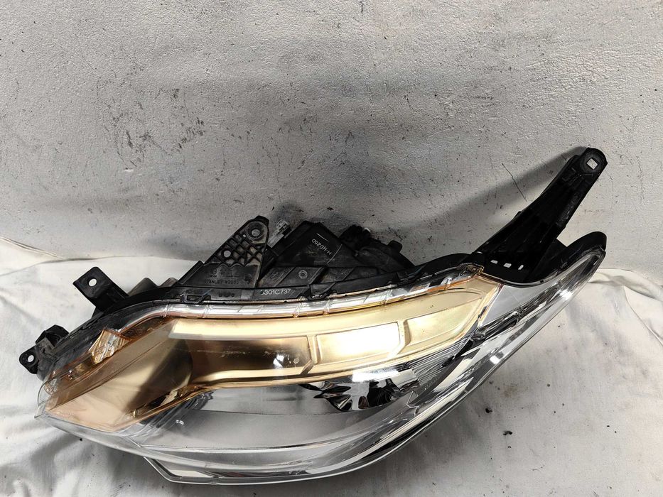 Оригинален фар Mitsubishi L200