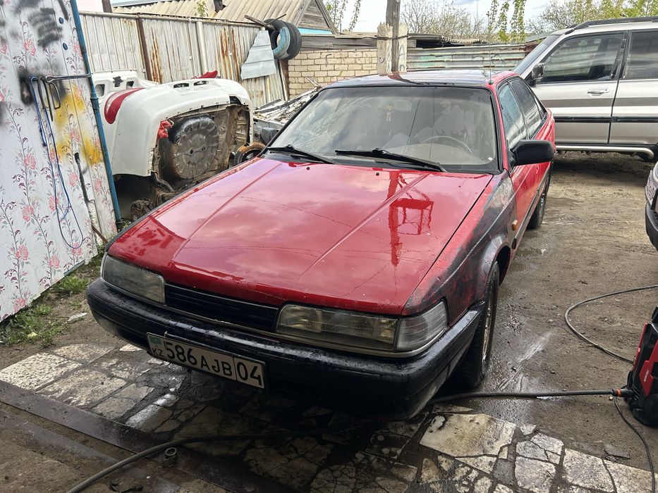 Машина Mazda 626