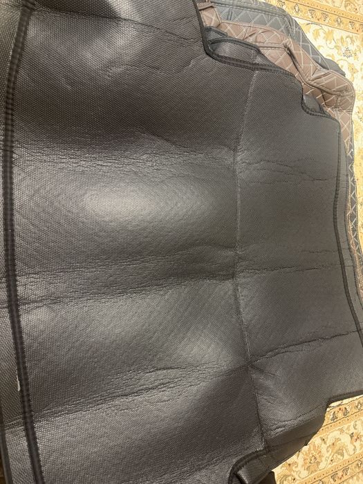 Полик в багажник Onix