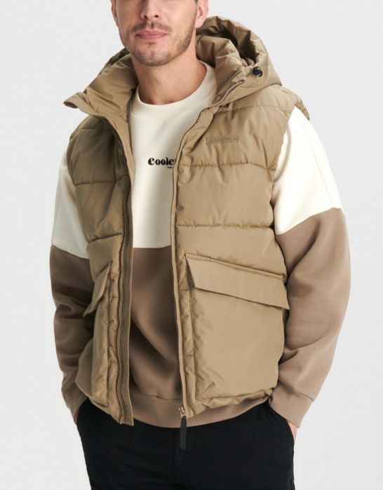 Капитониран елек