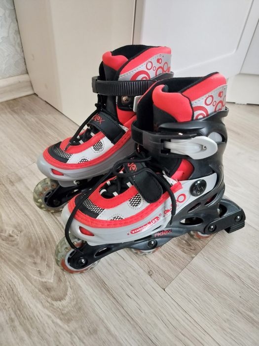 Роликовые коньки