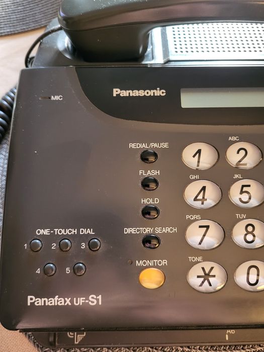 Телефон и факс Панасоник