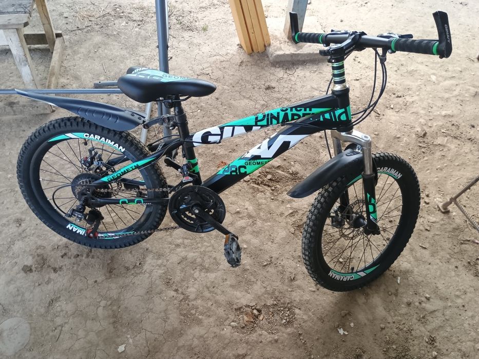 Giant Caraiman 20"frâne disc 21 viteze 7 și 12 ani.