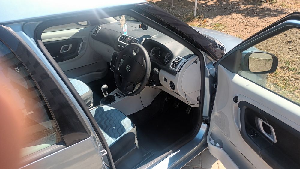 Vând Automobil Skoda Roomster