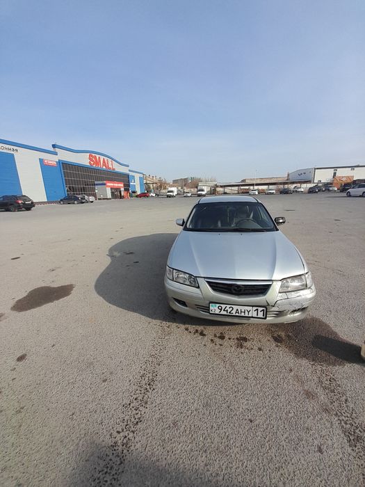 Мазда 626 птичка