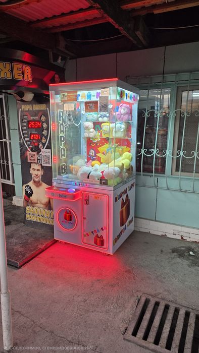 Игровой аппарат хватайка