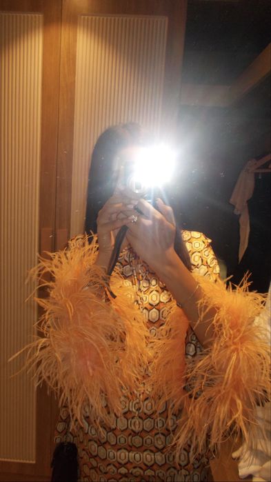 Двойка с перьями