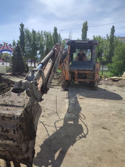 Экскаватор погрузчик 3 в 1 аренда