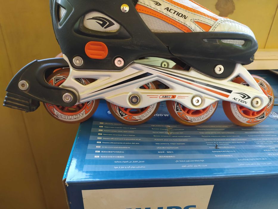 Роликовые коньки