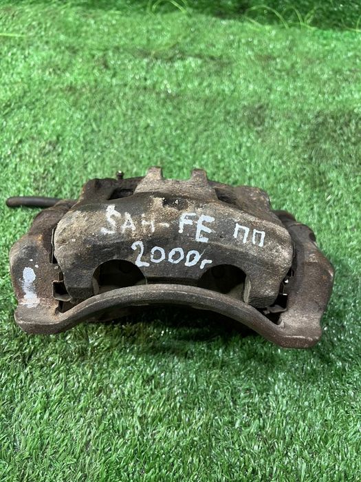 Суппорт передний правый Хендай Санта Фе I Hyundai Santa Fe