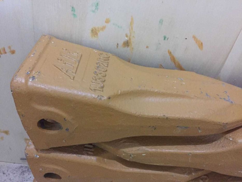 Коронки на экскаваторы caterpillar