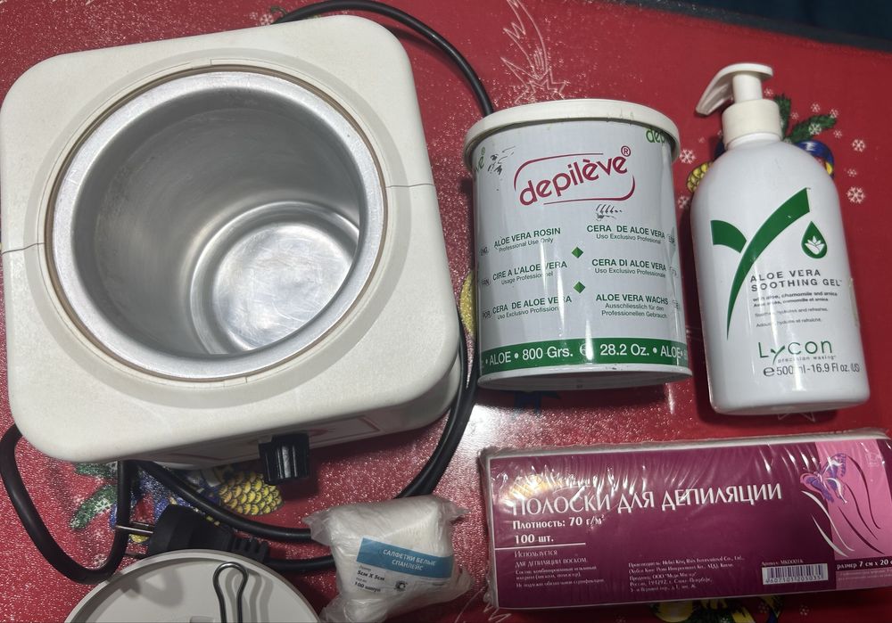 Воскоплав и воск для эпиляции.