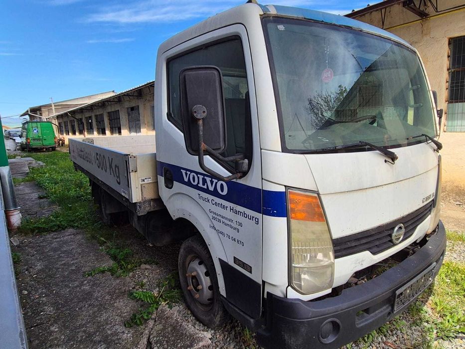 Nissan Cabstar 35.13 si Ford Transit