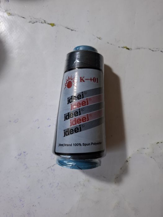 Нитки швейные машины.