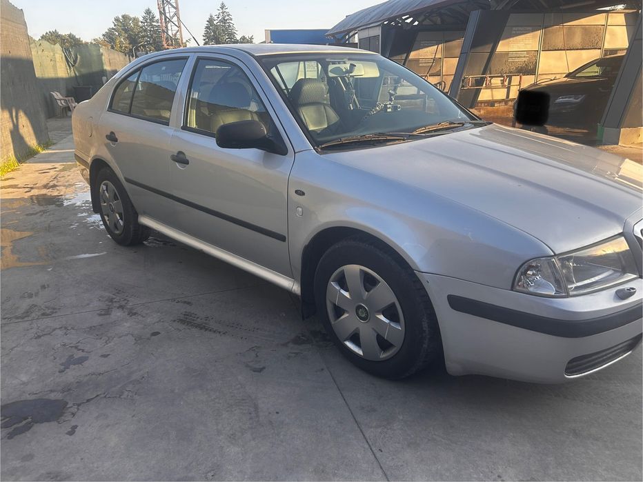 SKODA 100 2003 — imagine 2