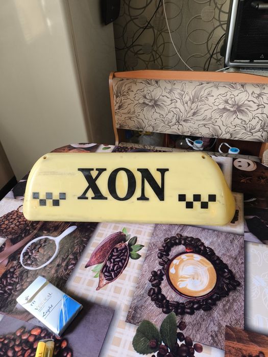 Такси белгиси, автомашина учун