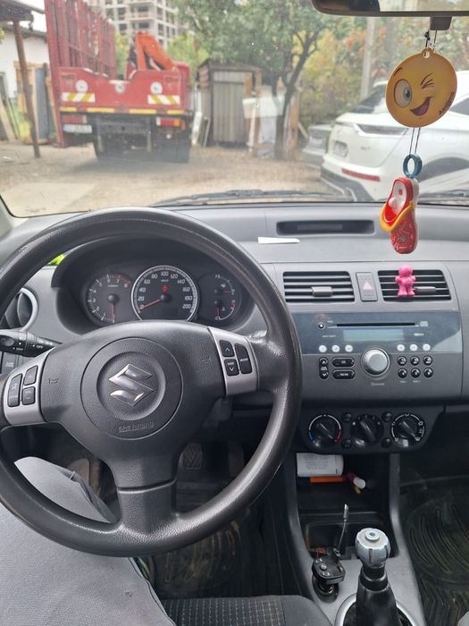 Suzuki Swift 2006 benzină, 1.508 € — imagine 5