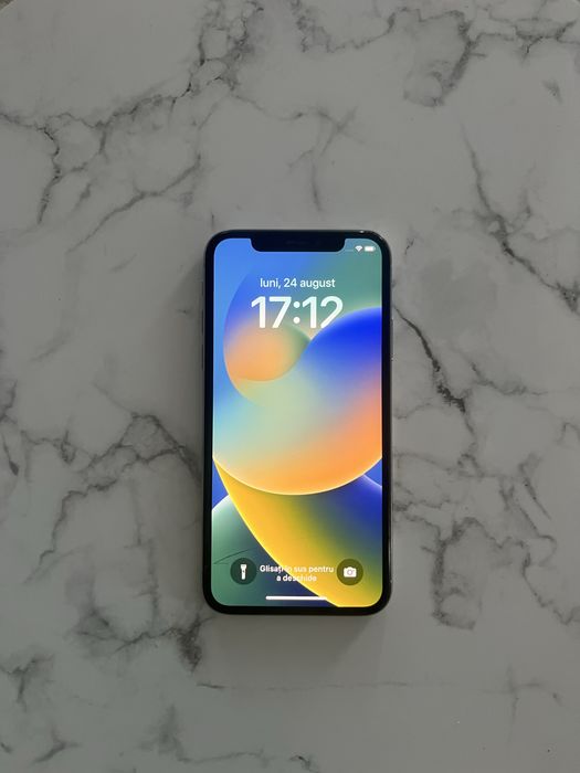 Vând IPhone X cu husa gratuita