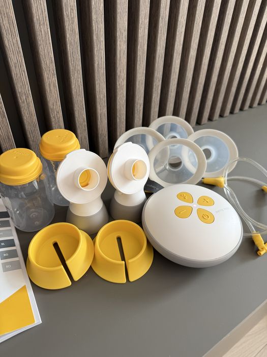 Двойна двуфазна помпа за кърма Medela - Swing Maxi