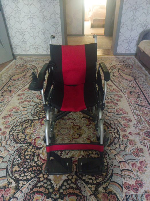 Электрическая инвалидная коляска