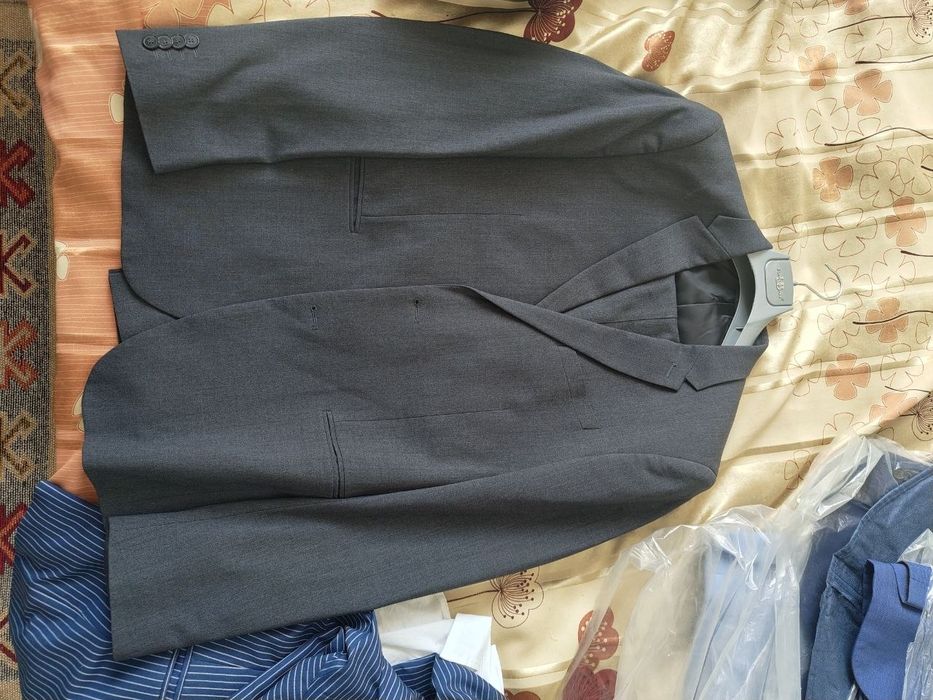 Мужские костюмы б/у