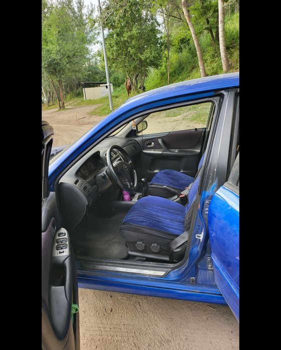 Mazda 323 (Торг)