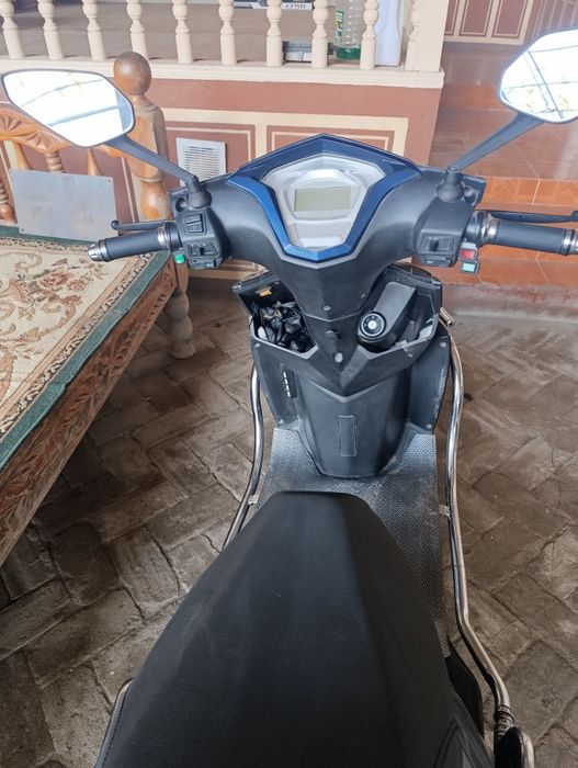 Срочно продам 500 доллар Скутер дугали 75_ 80 км бир заряд бн юради