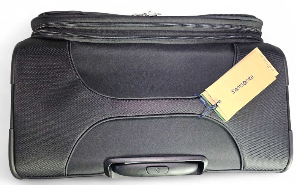 Samsonite - голям куфар с 4 колелца тип спинер