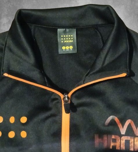 De vânzare Geacă sport XIOM x HANNO, negru cu portocaliu, unisex.