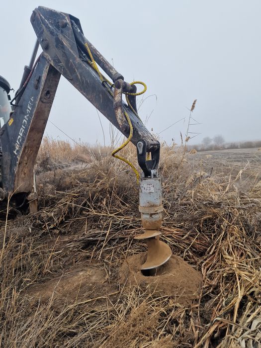 Услуга ямобур трактор три в один