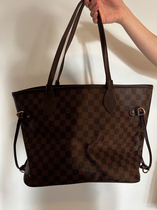 Vand geanta fake Louis Vuitton