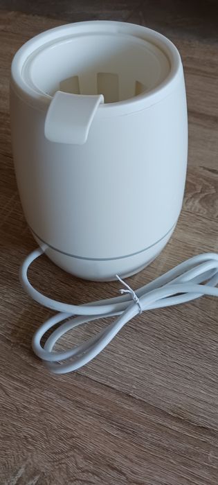 Уред за затопляне на бебешки бутилки и храна