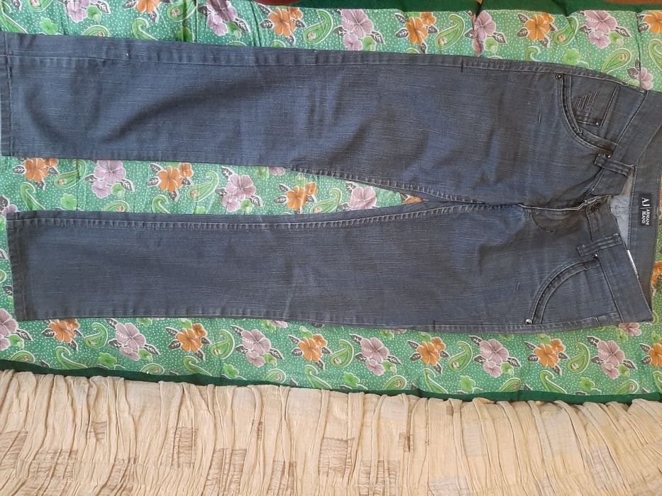 Серые джинсы на 42рр