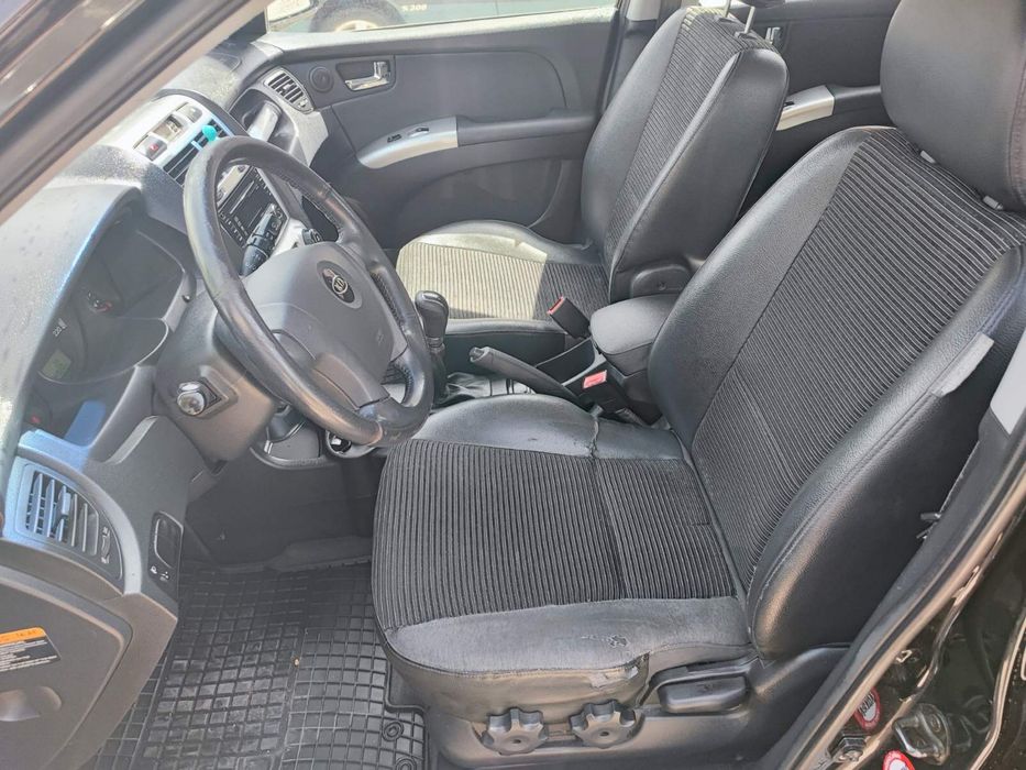 Кия спортидж бензин