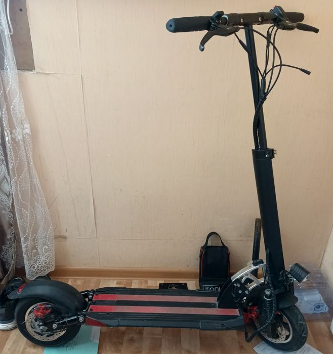 Электросамокат мощный.
