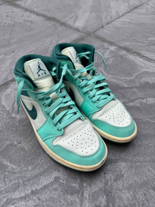 Air Jordan 1 Mid SE "Bleached Turquoise" sneakers.