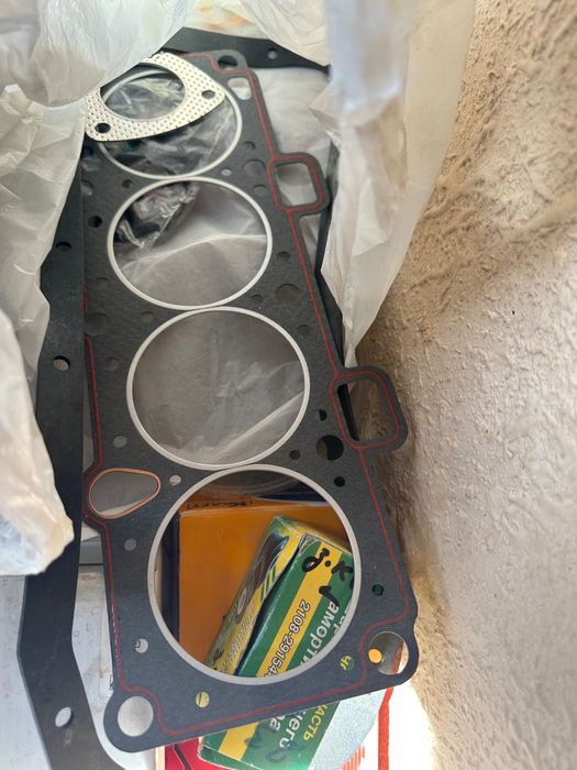 Прокладки двигателя, термостат и уплотнитель дверей,  на Лада Калина