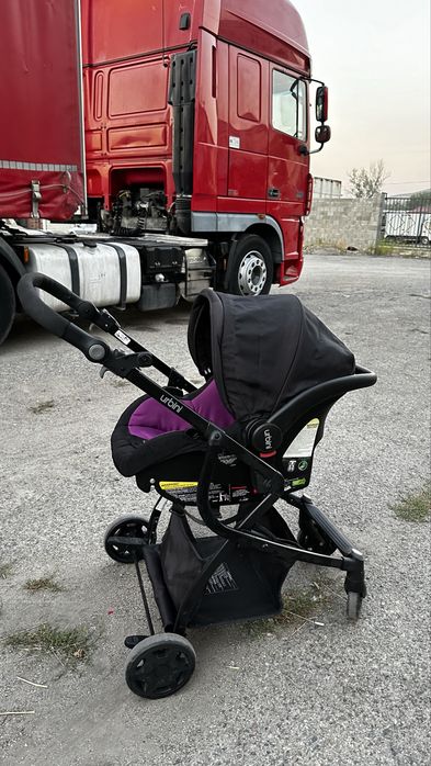 Коляска с автолюлкой