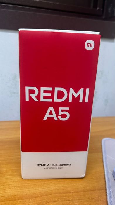 REDMI A5. новый.