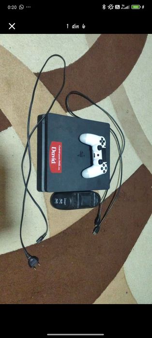 Vând PlayStation 4 și volan PlayStation + jocuri incluse