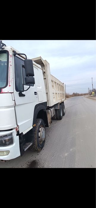 Экскаватор хизмати