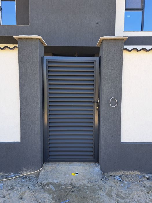 Executăm porți la comanda clientului din lamele executăm porți din șipcă metalică executăm porți din tablă decupată executăm porți din tablă cutată ex