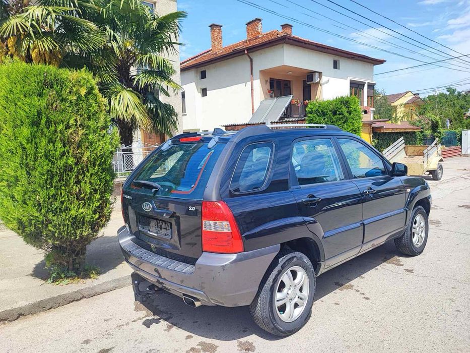 Кия спортидж бензин