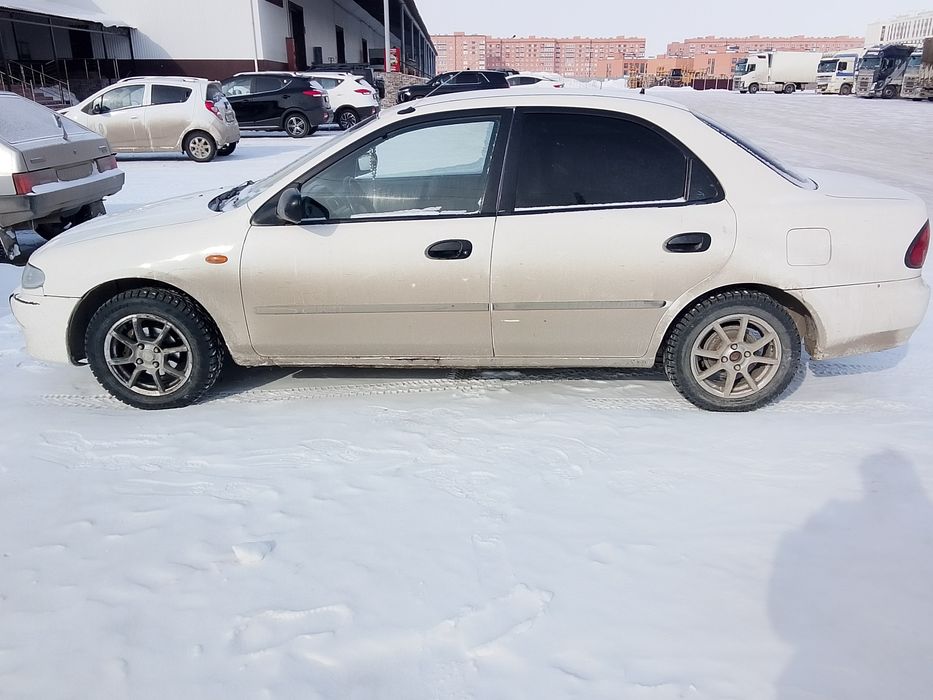 Мазда 323 j 96 год