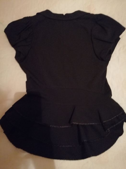 Елегантен елек с пеплум