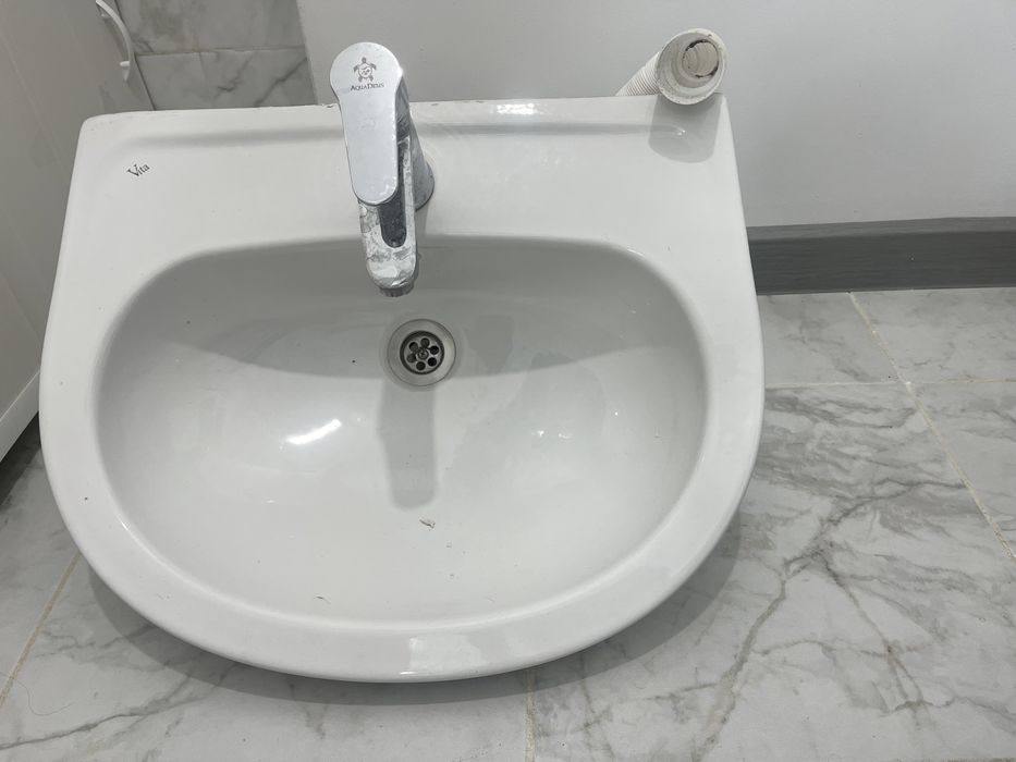 Новая раковина белая