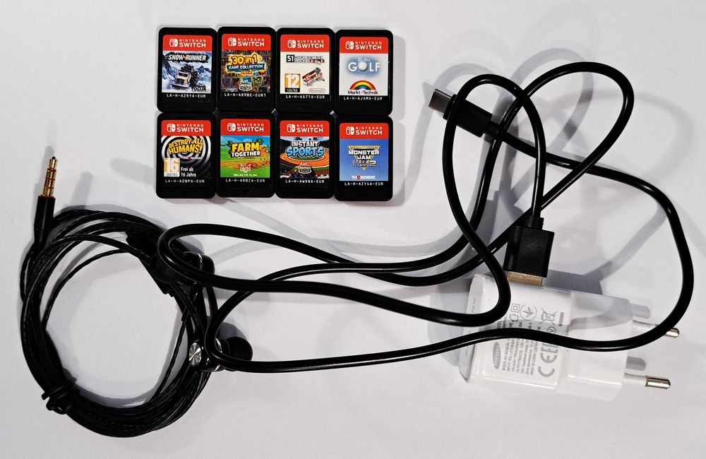 Nintendo Switch: 8 jocuri + husa + casti + incarcator