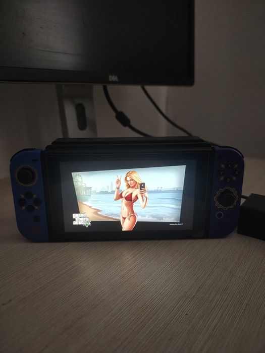 Nintendo Switch MODAT – Card 512GB – GTA 5 și multe jocuri instalate – Dock TV inclus preț fix
