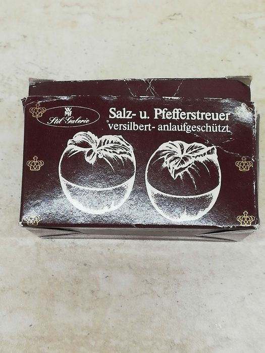 Сребърен комплект солница и пиперник